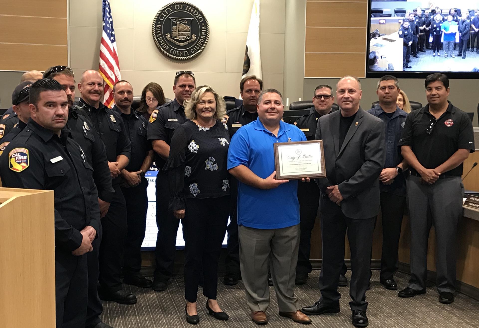 firefighters receiving award