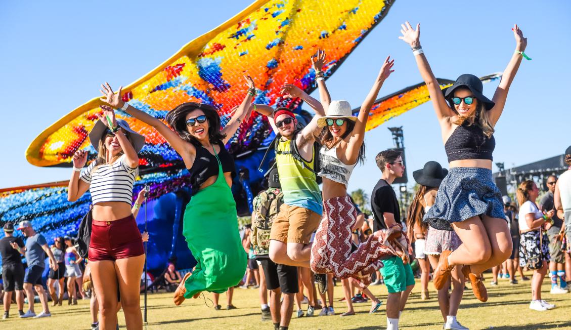 people jumping at festival