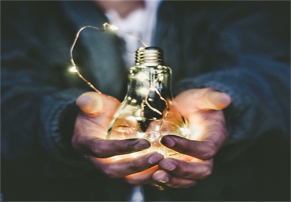 Lightbulb in hands